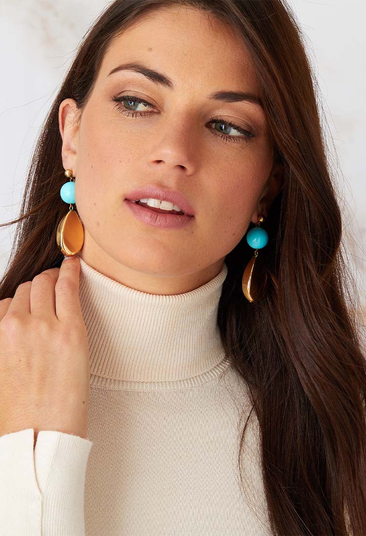 a pair of luxury Italian blue and gold statement earrings made of resin