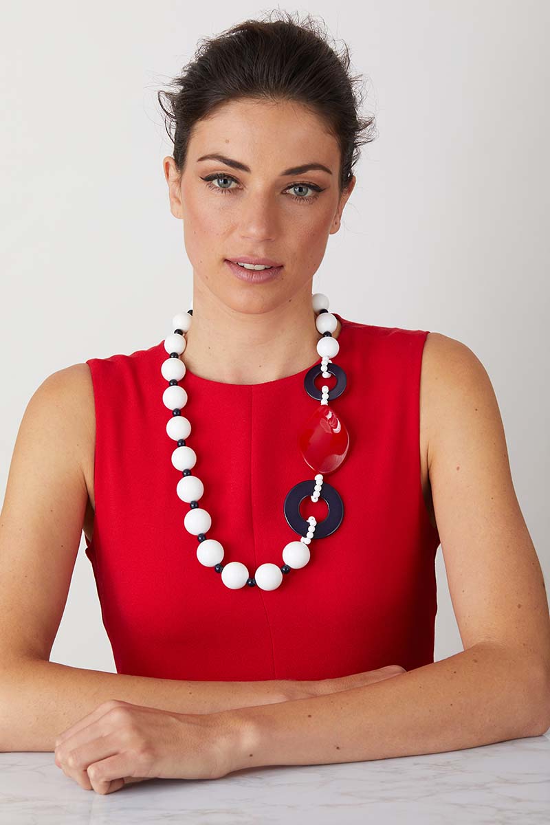 a luxury Italian white, blue and red statement necklace made of resin 